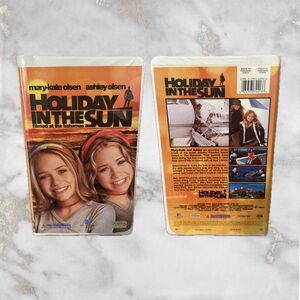 Holiday in the Sun VHS - Orange and Black